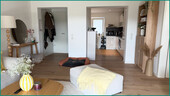 Der Blick in das Wohnzimmer vom Balkon aus - 