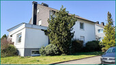 Gebäudeansicht mit Anbau des Wohnzimmers - Einfamilienhaus mit 216,00 m&sup2; in Radevormwald zum Kaufen