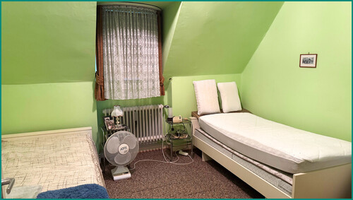 Ein weiteres Zimmer im Dachgeschoss - 