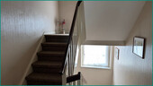 Oberes Treppenhaus mit Fensterbelichtung - 