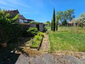 Foto - ObjNr:19684 - Freistehendes Einfamilienhaus mit Vor- und Rückgarten sowie Garage und Stellplatz
