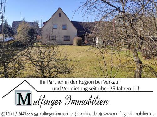 TITELBILD - Einfamilienhaus mit Garage und Garten