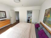 Schlafzimmer mit Zugang zum Garten und Terrasse Bild 3 - 