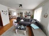 Wohnzimmer mit Zugang zum Garten Bild 2 - 7 Zimmer Einfamilienhaus in Höchstadt