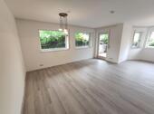 Wohnzimmer mit Zugang zur Terrasse Bild 2 - 