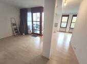 Wohn- /Essbereich mit Zugang zum Balkon Bild 1 - 