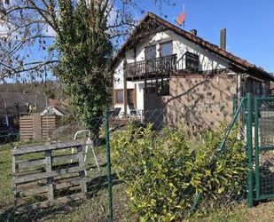 Romantisches Einfamilienhaus mit hochwertiger Ausstattung in ruhiger Randlage von 97450 Arnstein-Neubessingen (ID 10040)