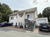 Ansicht - Schmitten: Leben im Grünen im Niedrigenergiehaus! EFH mit 100m² großer ELW in Top-Waldrandlage