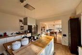 Küche und Wohnbereich - 5.5 Zimmer Einfamilienhaus zum Kaufen in Schmitten