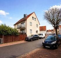 Karben: Modernes 3-Familienhaus im alten Ortskern von Petterweil