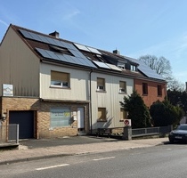 Mehrfamilienhaus mit Ladeneinheit und Entwicklungspotenzial auf großzügigem Grundstück in Frankfurt-Nieder Eschbach - Frankfurt am Main