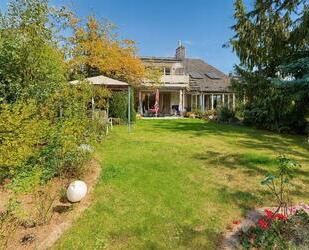 Wie im eigenen Haus! Repräsentative Wohnung mit schönem Garten in Dreieich-Offenthal!