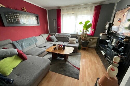 Wohnzimmer EG - 6 Zimmer Doppelhaushälfte zum Kaufen in Frankfurt am Main