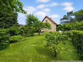 Blick vom Garten aufs Haus - 2 Zimmer 4- Zimmerwohnung zum Kaufen in Bergfelde