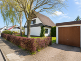 Nord-West-Ansicht von Haus und Garage - 