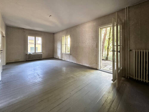 Wohnzimmer mit Terrassenausgang - 4 Zimmer Einfamilienhaus zum Kaufen in Kleinmachnow