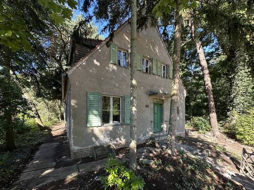 Straßenansicht - Originales Siedlungshaus mit besonderer Atmosphäre direkt am Grünzug