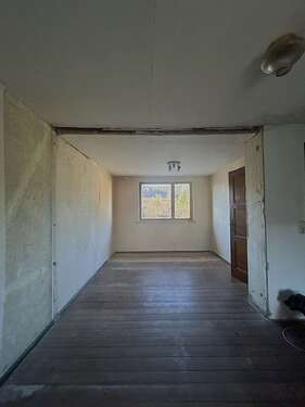 Schlafzimmer 1 mit Blick Garten - 