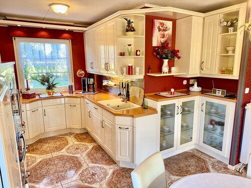 hübesche Einbauküche - Einfamilienhaus mit 140,00 m&sup2; in Holldorf OT Rowa zum Kaufen