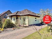 Einfamilienhaus in Krugsdorf - HORN IMMOBILIEN + Einfamilienhaus mit Einbauküche, Doppelgarage und Keller in Krugsdorf bei Pasewalk