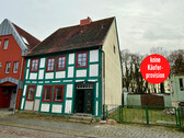 Stadthaus - HORN IMMOBILIEN++ Friedland, historisches Stadthaus mit 6 Zimmern, Kaminöfen, 2 Bädern und Garage