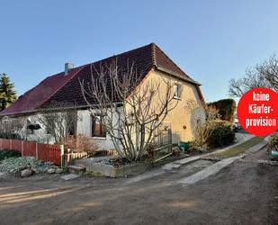 HORN IMMOBILIEN++ 15 km bis Neubrandenburg, schöne Doppelhaushälfte mit großen Grundstück & 2 Garagen - Bassow