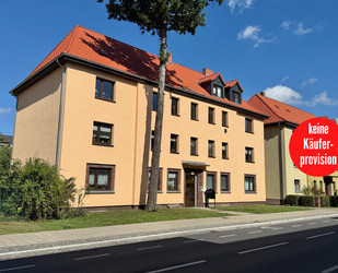 HORN IMMOBILIEN++RESERVIERT! Neubrandenburg, Mehrfamilienhaus mit 7 Whg., Garten, Keller & 9 Garagen -vermietet-