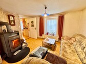 Wohnzimmer - 3 Zimmer Doppelhaushälfte zum Kaufen in Woggersin