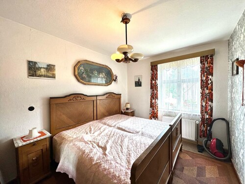 Schlafzimmer im Dachgeschoss - Einfamilienhaus mit 150,00 m² in Luckow / Rieth zum Kaufen
