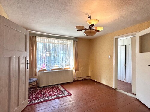 Wohnzimmer - 4 Zimmer Einfamilienhaus zum Kaufen in Ducherow