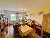 Wohnzimmer - Einfamilienhaus mit 120,00 m² in Neuenkirchen / Neverin zum Kaufen