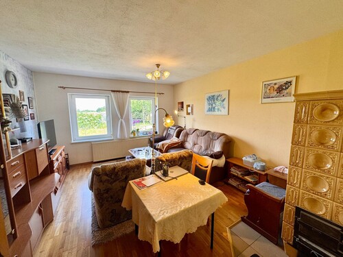 Wohnzimmer - Einfamilienhaus mit 120,00 m² in Neuenkirchen / Neverin zum Kaufen