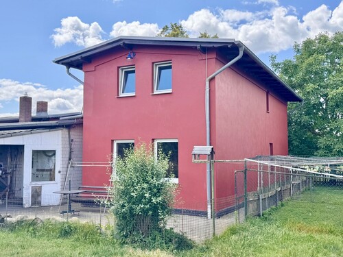 Hausansicht Rückseite - 5 Zimmer Einfamilienhaus zum Kaufen in Neuenkirchen / Neverin