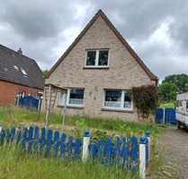 Zwangsversteigerung: großes Grundstück mit Einfamilienhaus und Nebengebäuden - Apen
