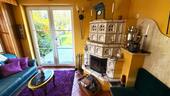 Diele mit Kamin und Ausgang zur Terrasse - 