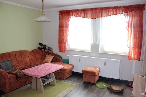 Wohnzimmer der 2-Zimmer Wohnung im Haus 1 - 1.OG - 