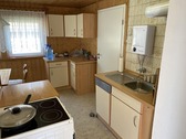 Küche mit Tür zum Wohnzimmer - 