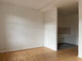 Wohnzimmer mit offener Küche - 