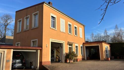 Ansicht Nebengebäude mit Wohnung im 1.OG - 