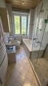 Bad mit Wanne und Dusche - 