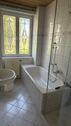 Bad mit Wanne und Dusche - 