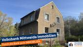 Hausansicht - Einfamilienhaus mit großem Grundstück und Doppelgarage in ruhiger Lage!