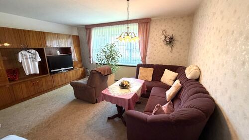 Wohnzimmer im EG - 5 Zimmer Einfamilienhaus zum Kaufen in Königshain-Wiederau