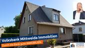 Hausansicht - Einfamilienhaus mit großem Grundstück und vielseitigem Nebengebäude in ruhiger Lage