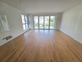 Wohnzimmer mit offenem Küchenbereich - 3 Zimmer Etagenwohnung in Burgstädt
