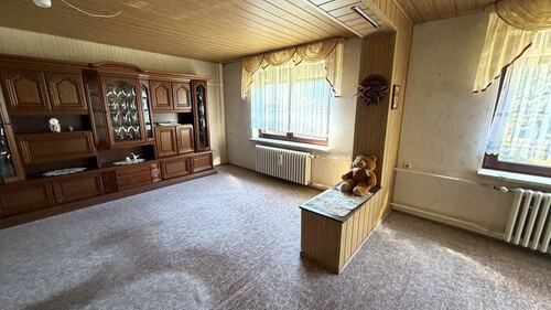 Wohnzimmer - 5 Zimmer Einfamilienhaus zum Kaufen in Erlau