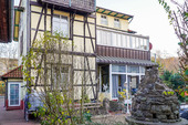 Terrasse und Hausrückseite - 