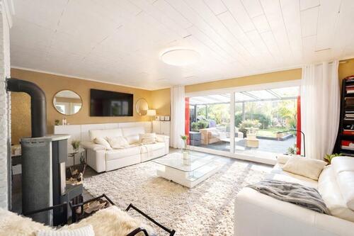 Wohnzimmer mit Kaminofen - 