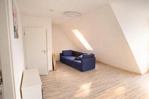 Wohnzimmer - Dachgeschoßwohnung mit 65,00 m&sup2; in Henstedt-Ulzburg zum Kaufen