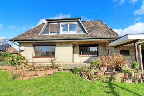 Hauptbild - 6 Zimmer Mehrfamilienhaus, Wohnhaus zum Kaufen in Alveslohe